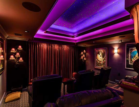 Stealth surround sound installation with hidden speakers