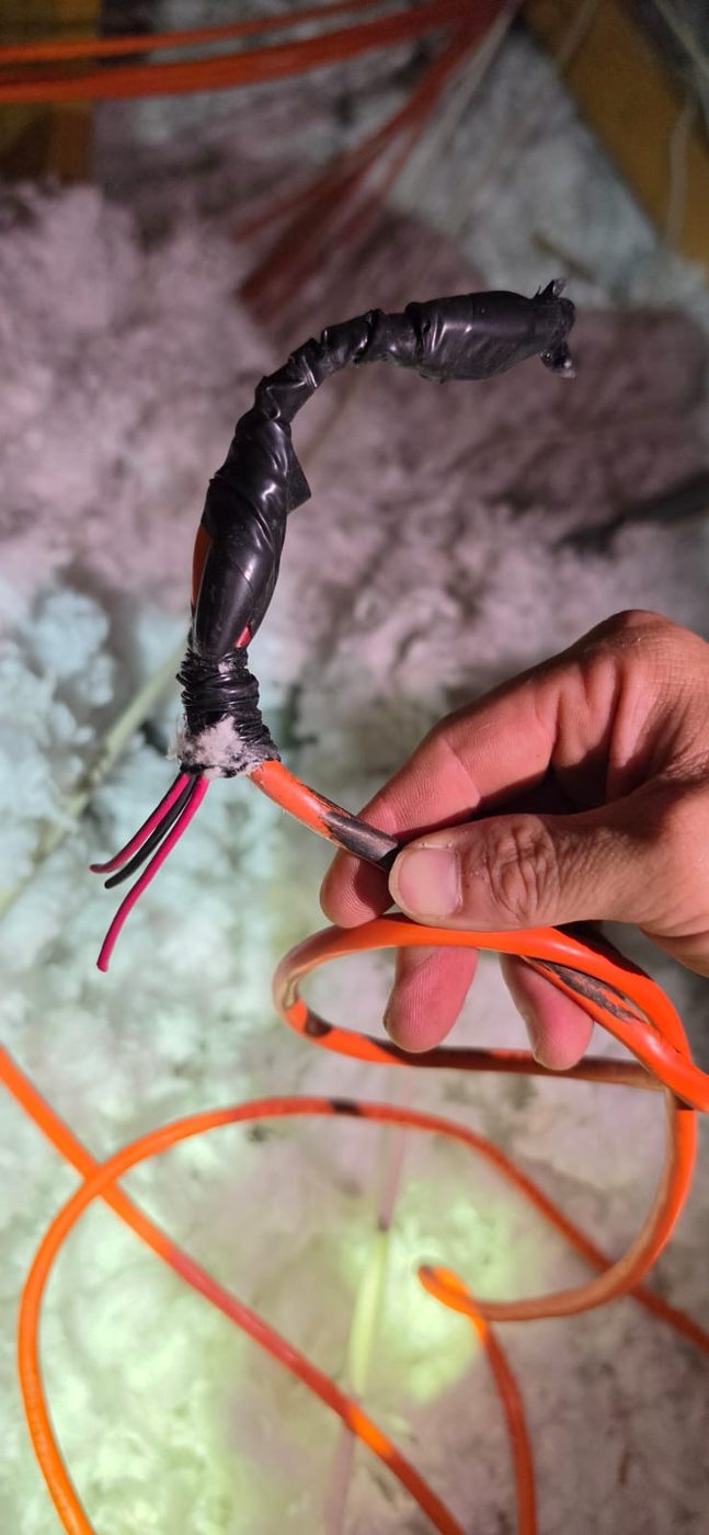 AV wire spliced together with electrical tape instead of a proper connector