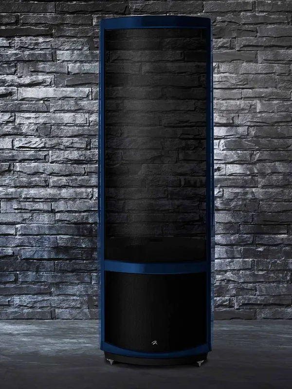 MartinLogan Masterpiece Series electrostatic speaker against a stone wall