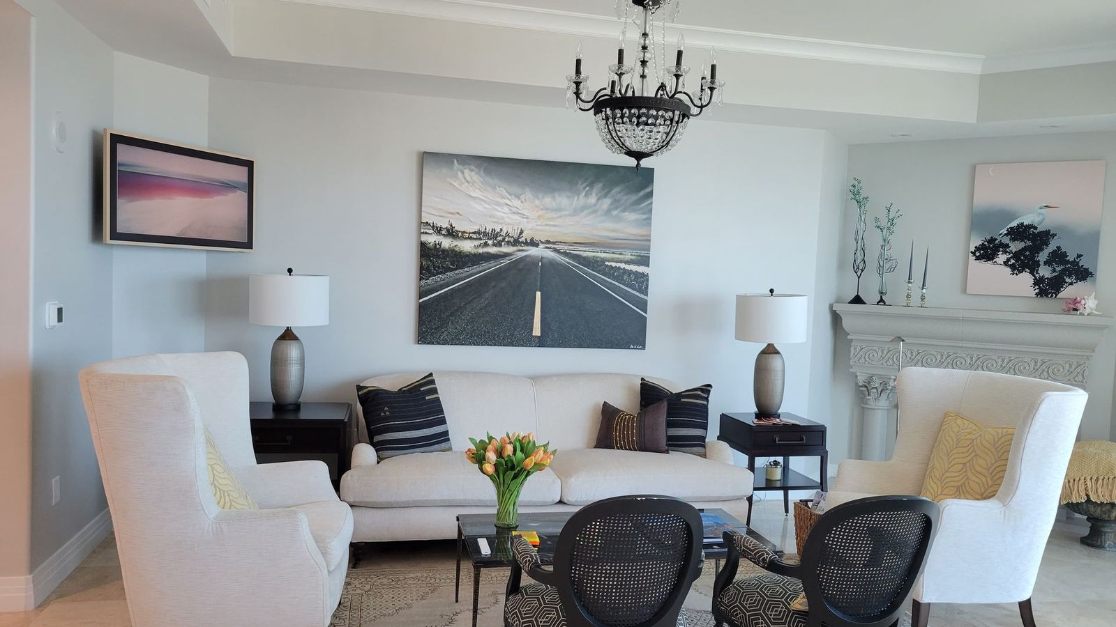 Elegant living room with Samsung Frame TV and chandelier