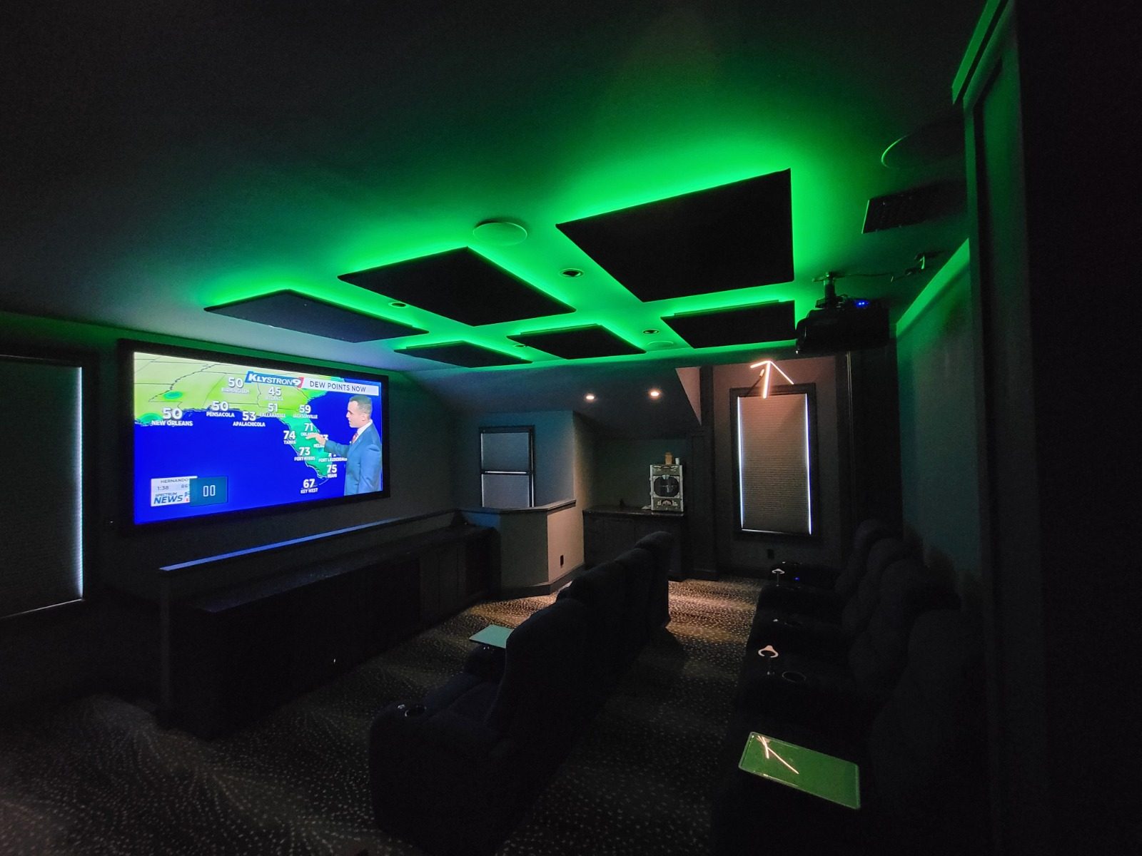 Home theater with green LED ceiling lighting