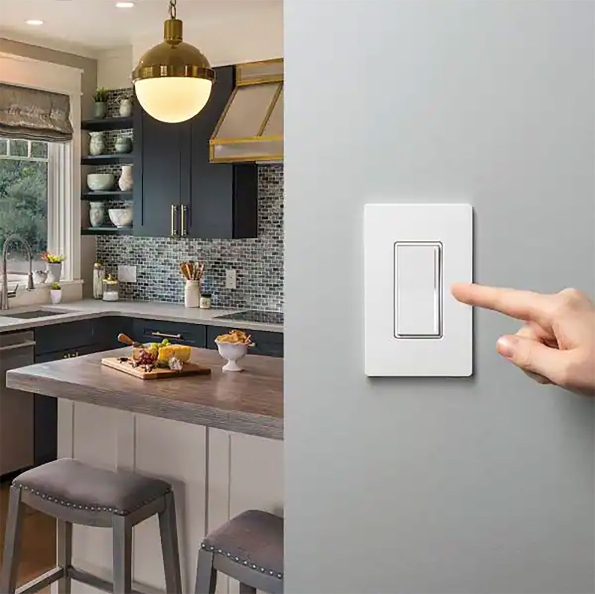 Lutron dimmer keypad installed on a kitchen wall — a wall-mounted lighting control by Entertainment Pros