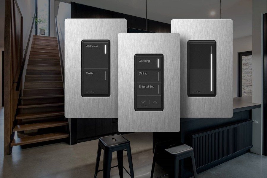 Lutron Sunnata keypads with engraved scene buttons mounted on a wall in a modern home