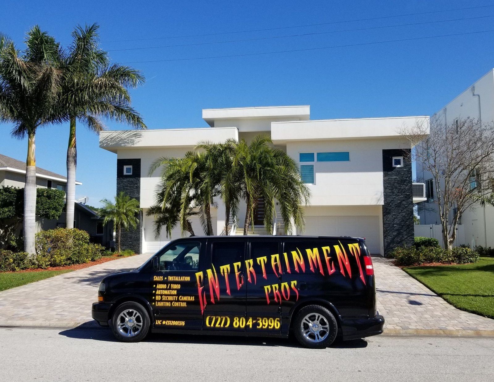 Entertainment Pros service van parked at a customer's home in Pinellas County
